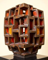 This cast bronze sculpture features a captivating repetitive cube pattern rendered in Escher-style impossible geometry. The w