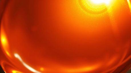 Experience the warm, luxurious feel of a golden glow reflecting off a glass object, showcasing smooth gradient textures in st