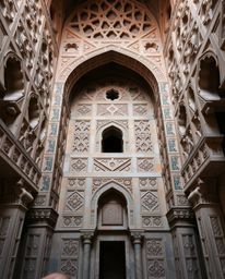 Explore precise architectural photography showcasing Islamic geometric patterns meticulously carved in stone.  These images c