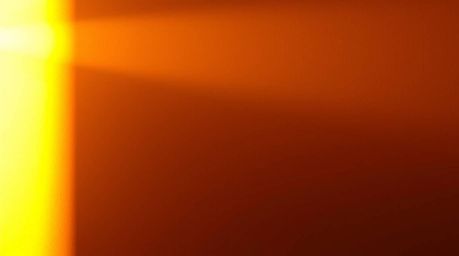 Explore the captivating interplay of light and shadow with chiaroscuro lighting, enhanced by a warm golden glow and an abstra