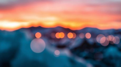 A captivating creative light art piece depicting a mesmerizing sunset over icy glaciers in the polar region. The artwork feat