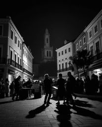 A captivating monochrome image showcases a vibrant musical performance in a brightly lit town square.  The use of pure jet bl