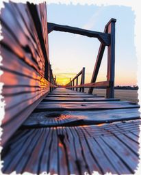 An extreme close-up color sketchnote of an old wooden bridge at sunset. This piece is presented in a hand-drawn style, emphas