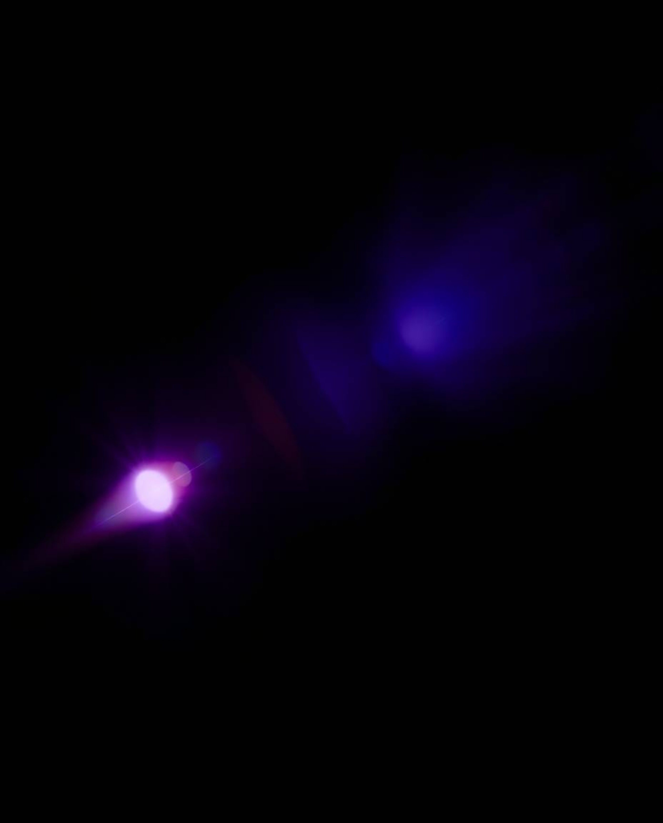 A captivating image showcases a dramatic interplay of intense black and a soft gradient of pink, blue, and violet hues.  The 