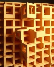 An unusual and original photograph depicts a repetitive cube pattern in Escher-style impossible geometry.  Soft pastel colors