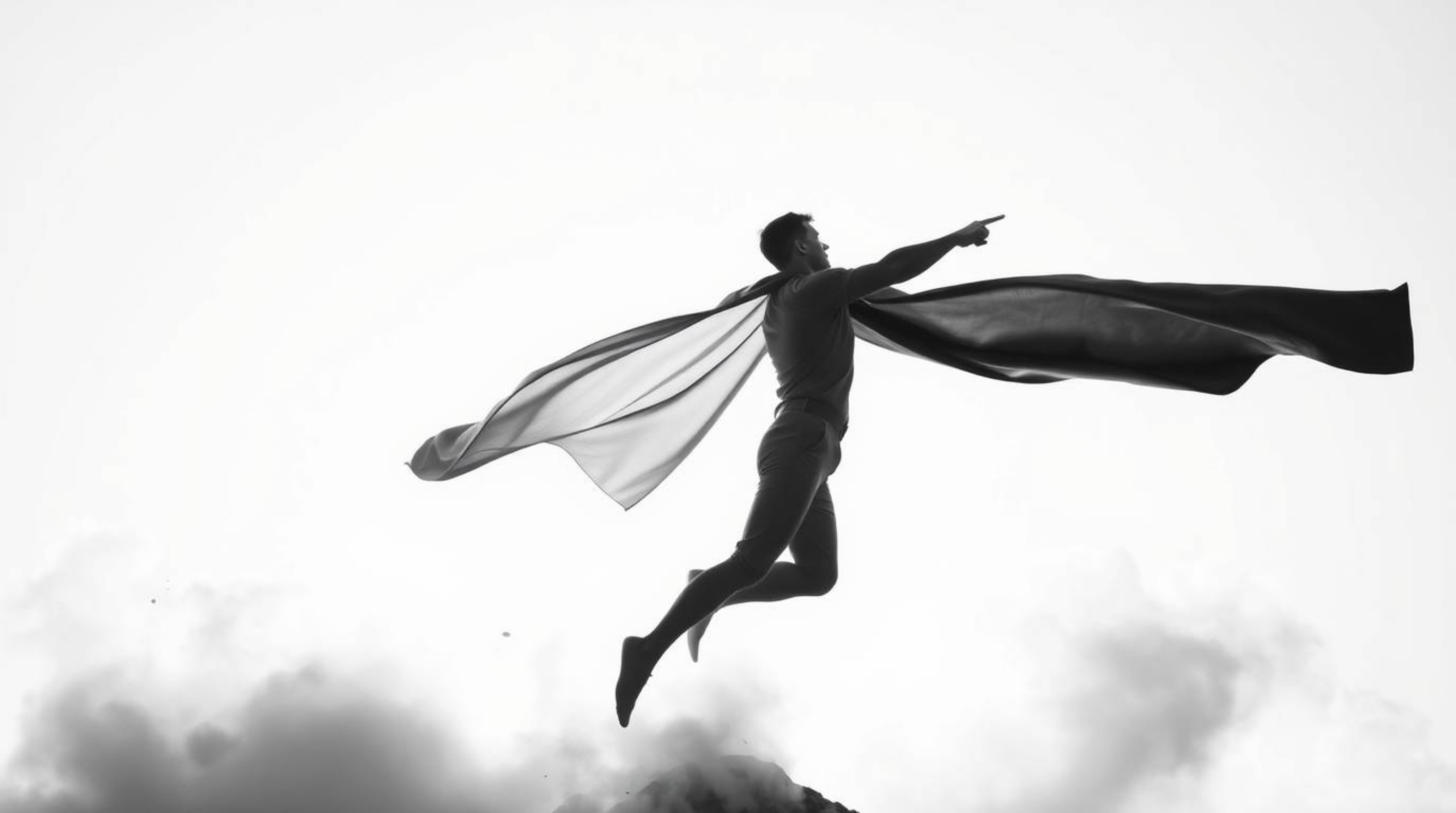 A classic black and white image portrays an ethereal and spiritual superhero, distinguished by a softly defined cape, in the 