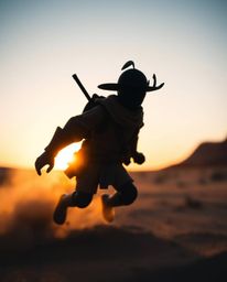 A captivating extreme macro close-up reveals a silhouetted Disney-style hero embarking on a thrilling desert adventure.  This