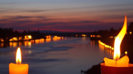 Capture the serene beauty of a river delta bathed in the warm hues of twilight, a high-resolution stock photo showcasing flic