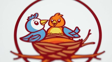 A close-up logo featuring two cartoon birds constructing a nest. The design utilizes a classic animation style with clean li