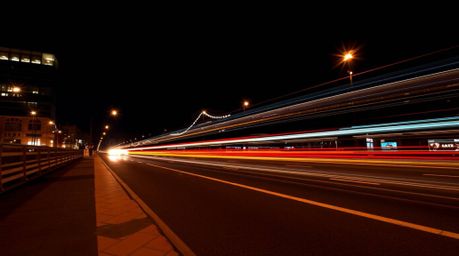 Explore the captivating world of long exposure photography featuring a bear family on an urban adventure. Immerse yourself in