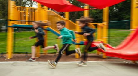 Experience a dynamic and dramatic slow-motion run through a playground.  This captivating imagery emphasizes blurred lines an