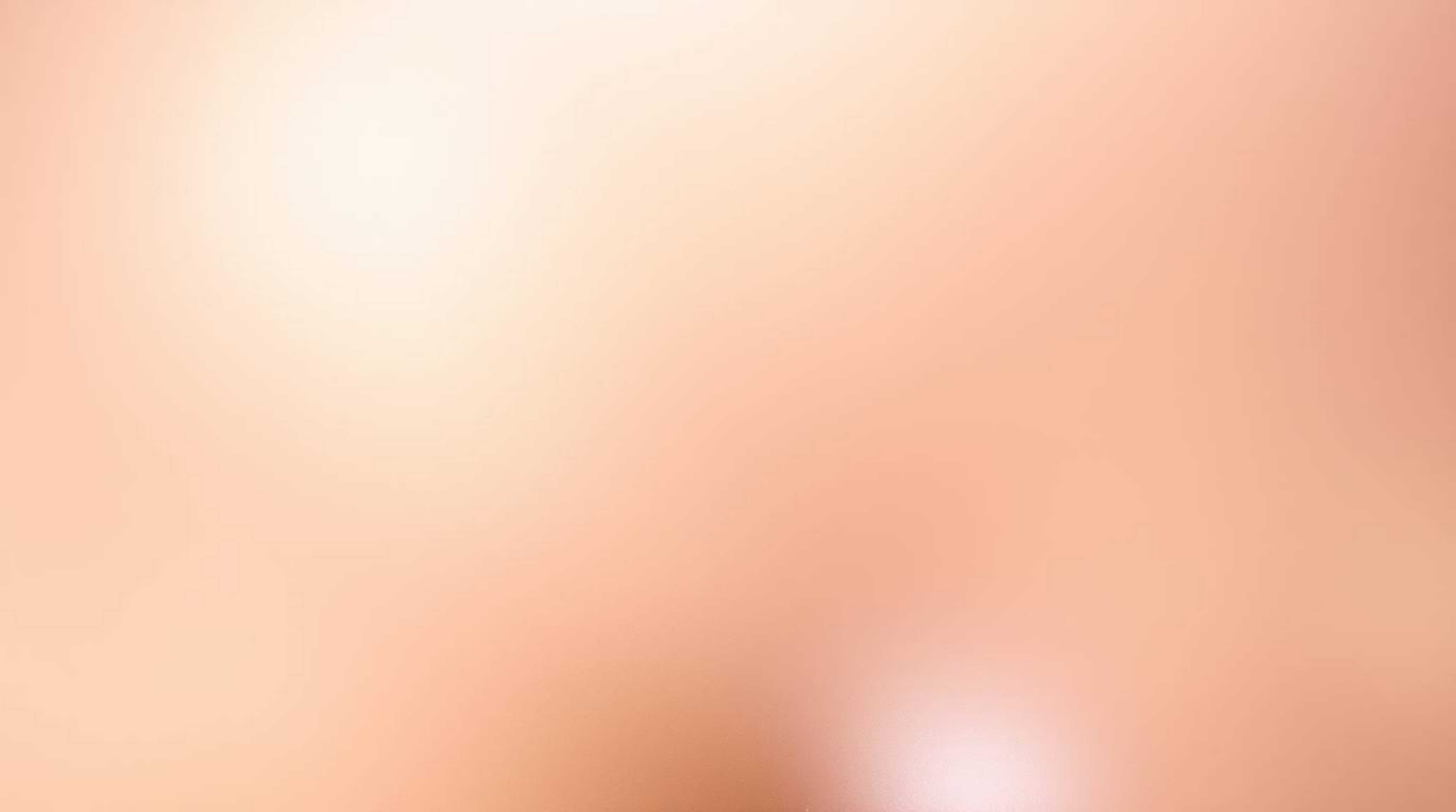 Discover a captivating image featuring a metallic surface with an iridescent gradient texture. Vibrant color shifts in brown
