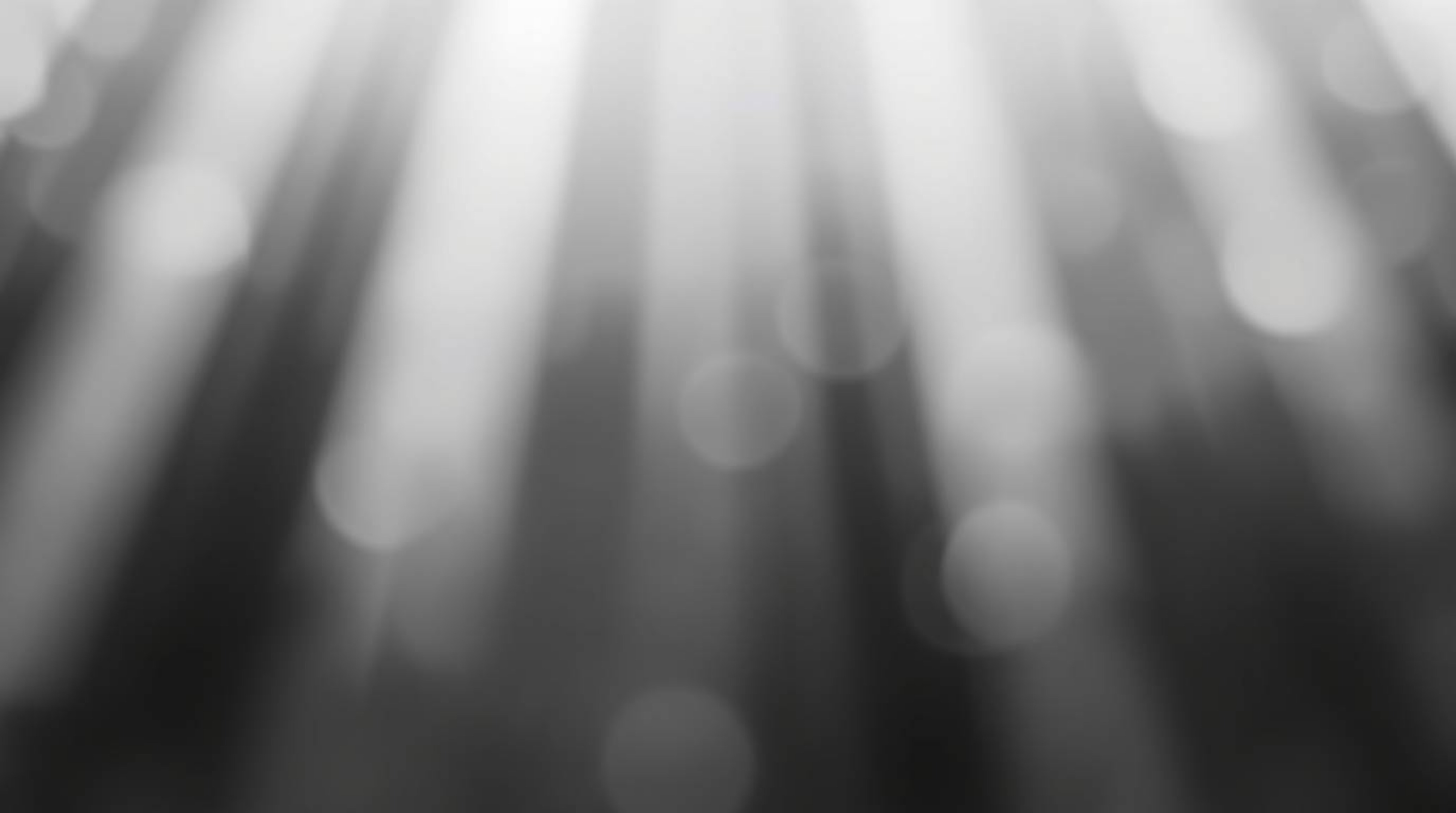 A classic black and white photograph showcasing an abstract poster design.  The image utilizes a gradient mesh pattern with v