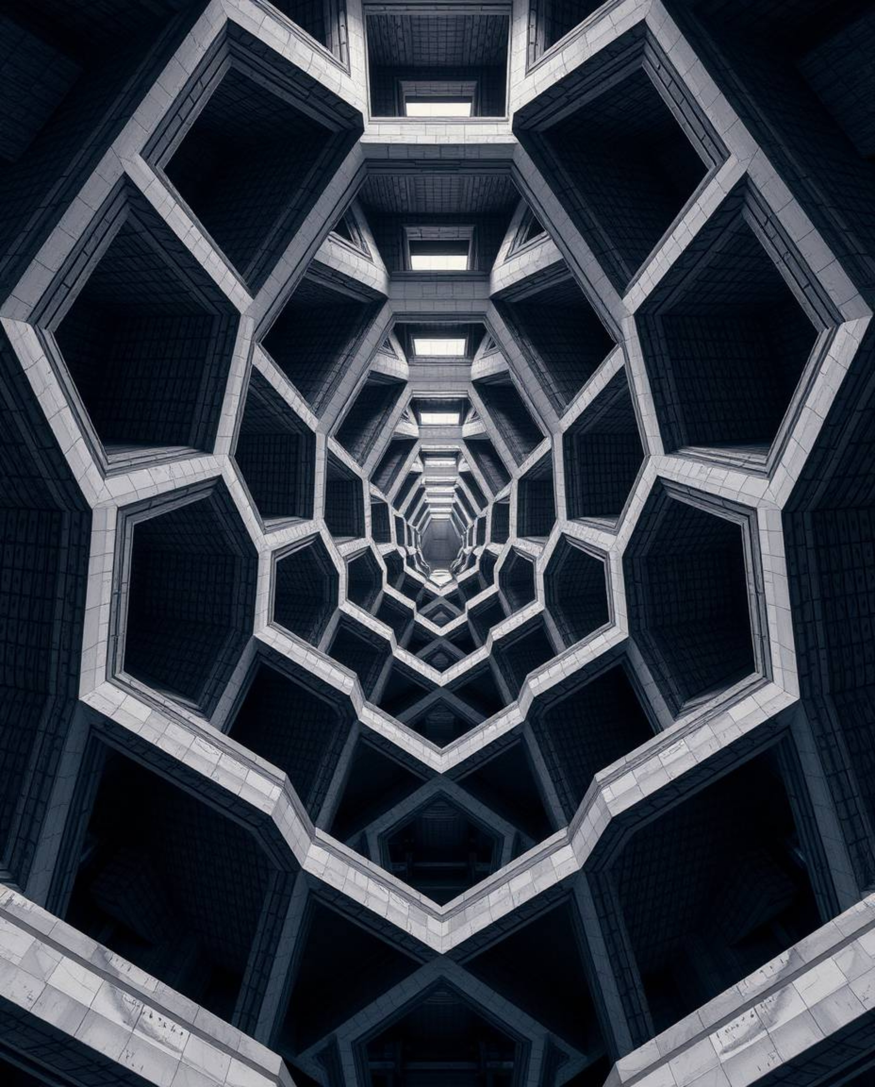 This stunning architectural photography showcases a mesmerizing repetitive cube pattern, reminiscent of Escher's impossible g