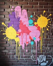 This editorial-style photography showcases a unique take on graffiti art.  Soft pastel colors and gentle tones create a sooth