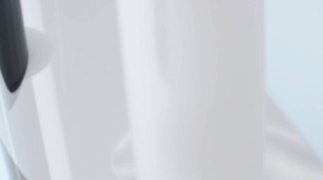 This image showcases a close-up shot of a glass object beautifully reflecting smooth gradient textures, embodying a modern fl