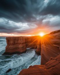 A dynamic photograph depicts a sunset illuminating sandstone cliffs under intense weather conditions. The image captures a st