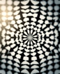 Explore the mesmerizing world of black and white geometric patterns in an optical illusion style, reminiscent of retro vibes.