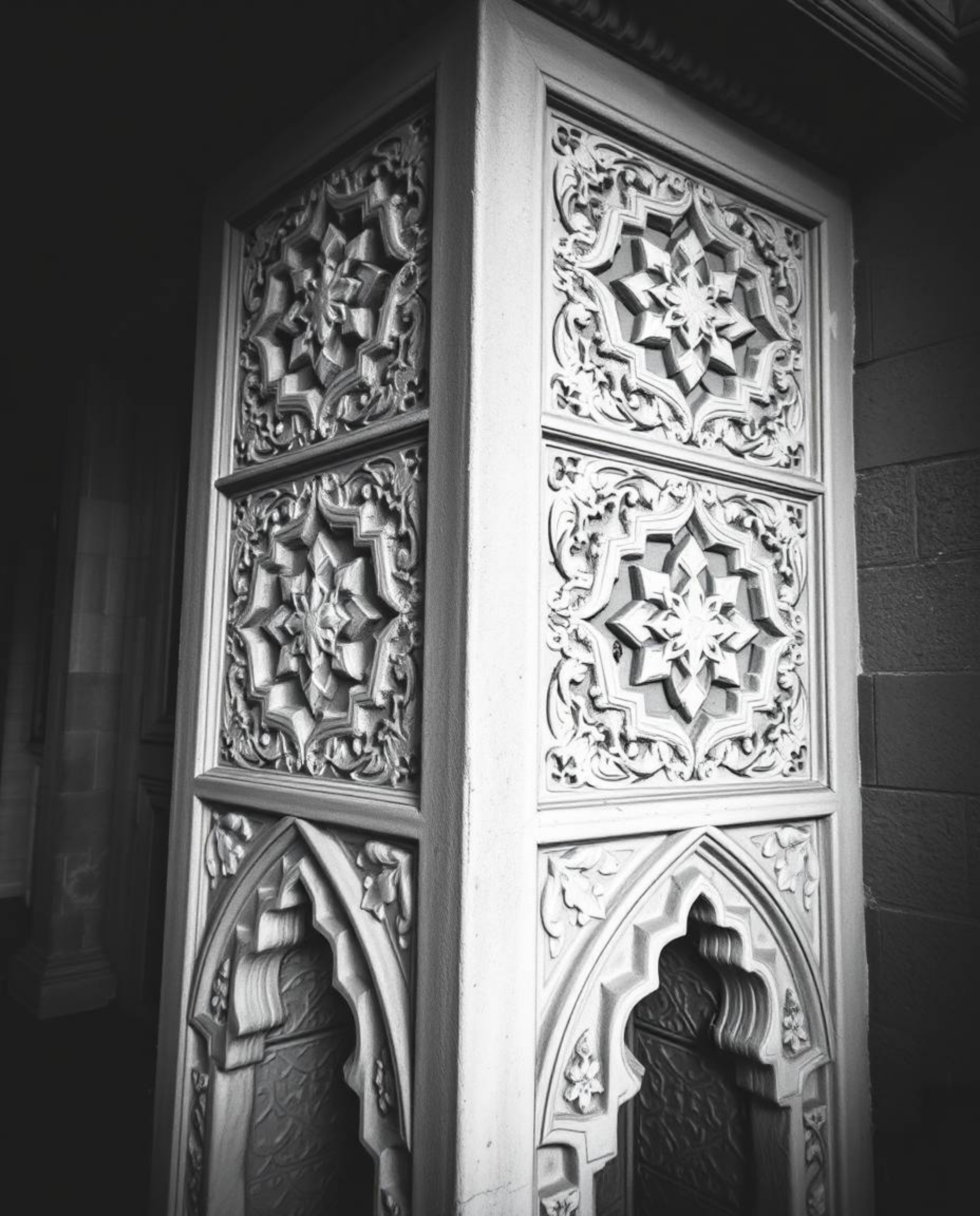 Explore the timeless elegance of Islamic art through classic black and white photography featuring intricate geometric patter