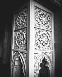 Explore the timeless elegance of Islamic art through classic black and white photography featuring intricate geometric patter