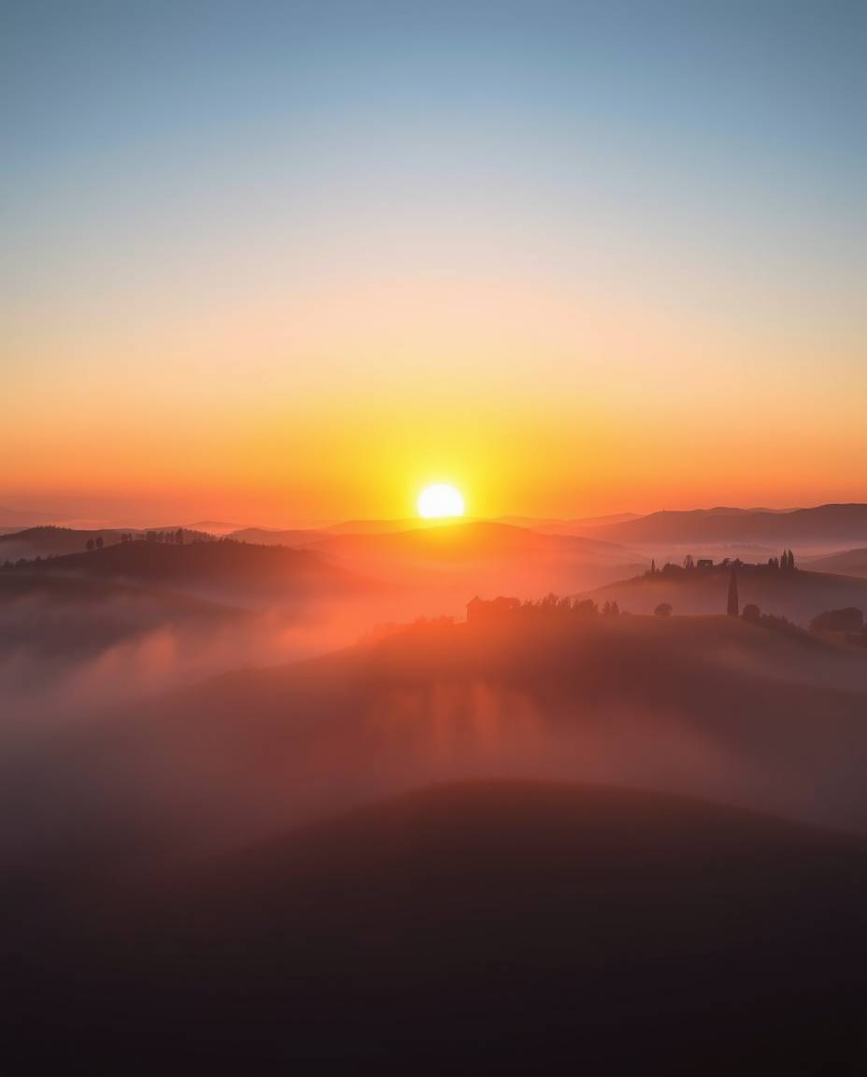 This is an ethereal and spiritual origami-style image depicting a sunset over the misty, rolling hills of Tuscany. Characteri