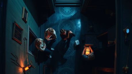 Experience a thrilling overhead view of a group of teenage detectives unraveling mysteries within a chilling haunted mansion.