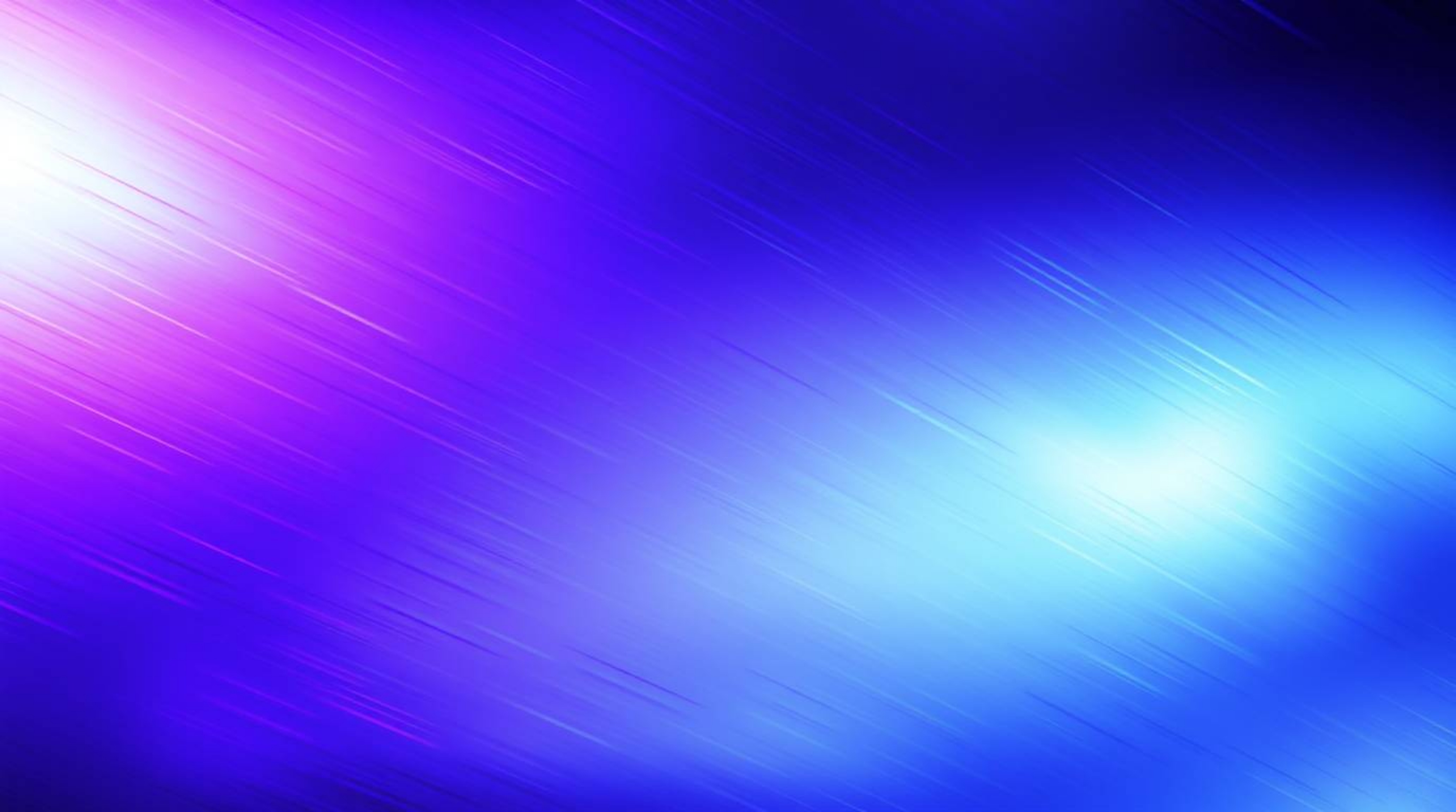 A dynamic deep ultraviolet image showcases an iridescent gradient texture on a metallic surface, featuring vibrant color shif