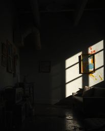 A captivating visual experience featuring high contrast and low key lighting techniques, revealing deep shadows within a room