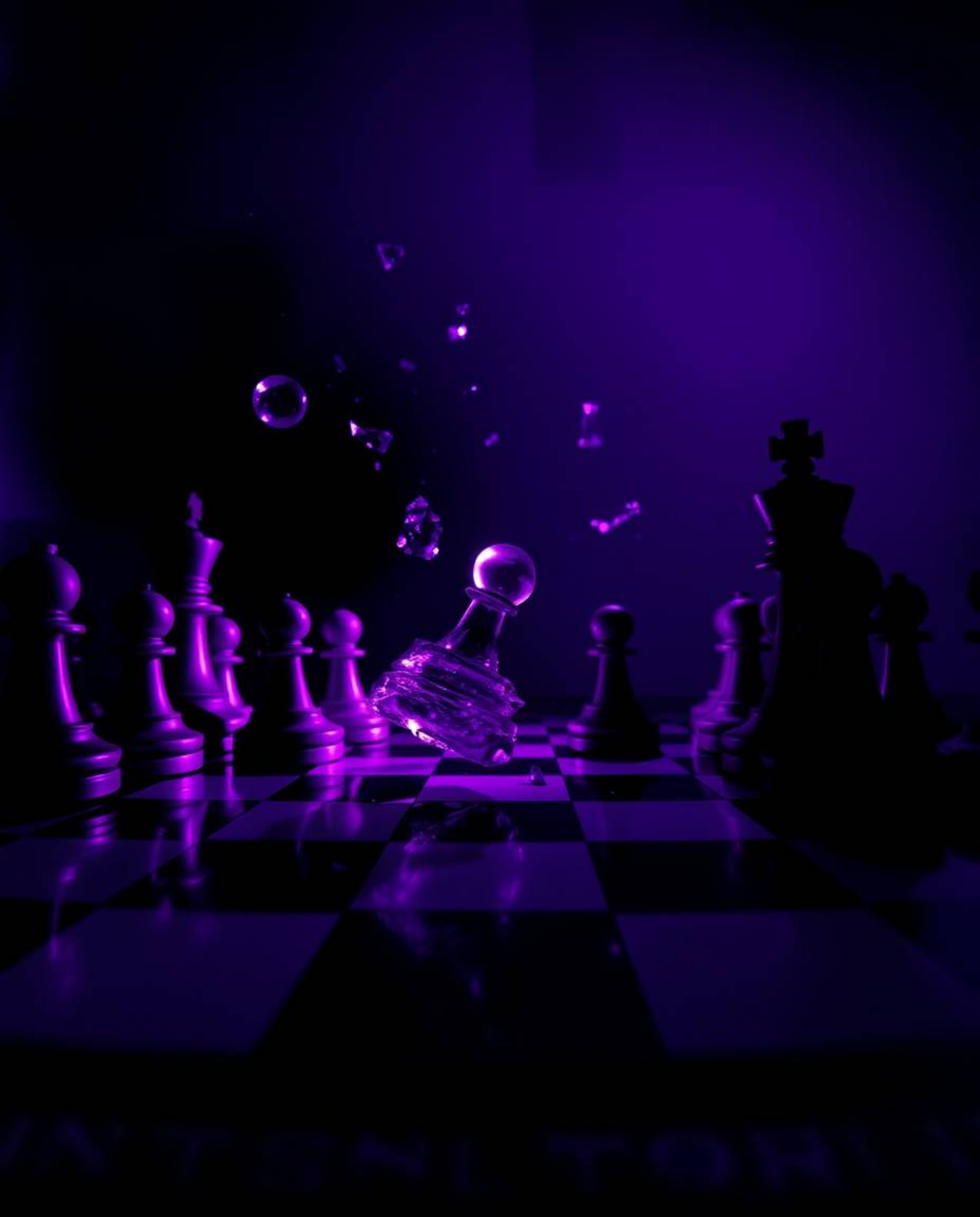 This striking low-angle photograph captures a chessboard in a state of dynamic destruction, with chess pieces frozen mid-air.