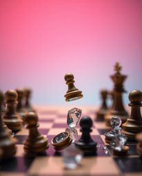 An extreme macro close-up captures a chessboard in a state of frozen destruction, with pieces suspended mid-air. The image em