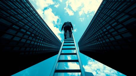 A visually striking image of a businessperson ascending a transparent ladder that seemingly disappears into the vast blue sky