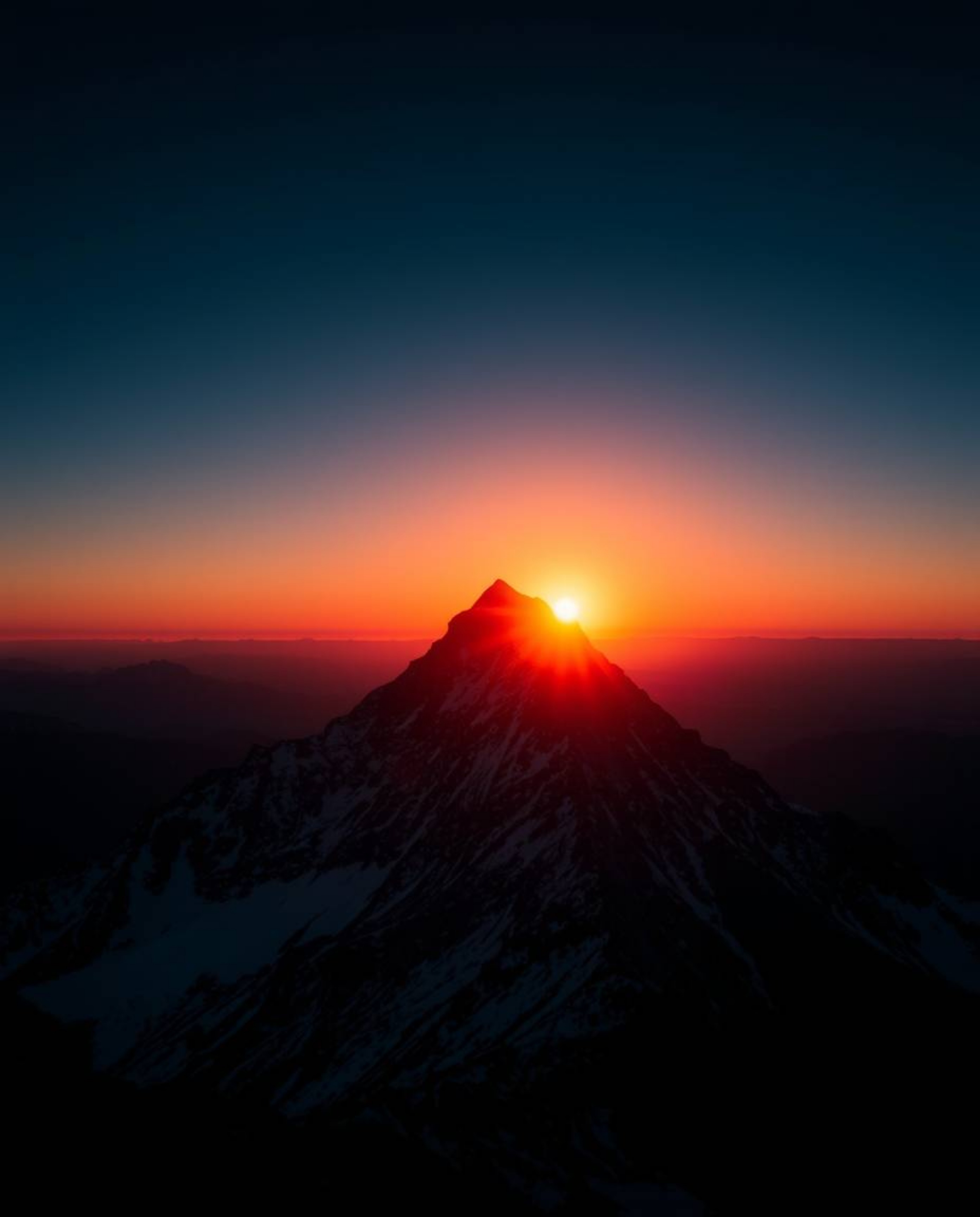 Experience a dramatic effect with this high-contrast, low-key lighting composition. Featuring a tight close-up of a high alpi