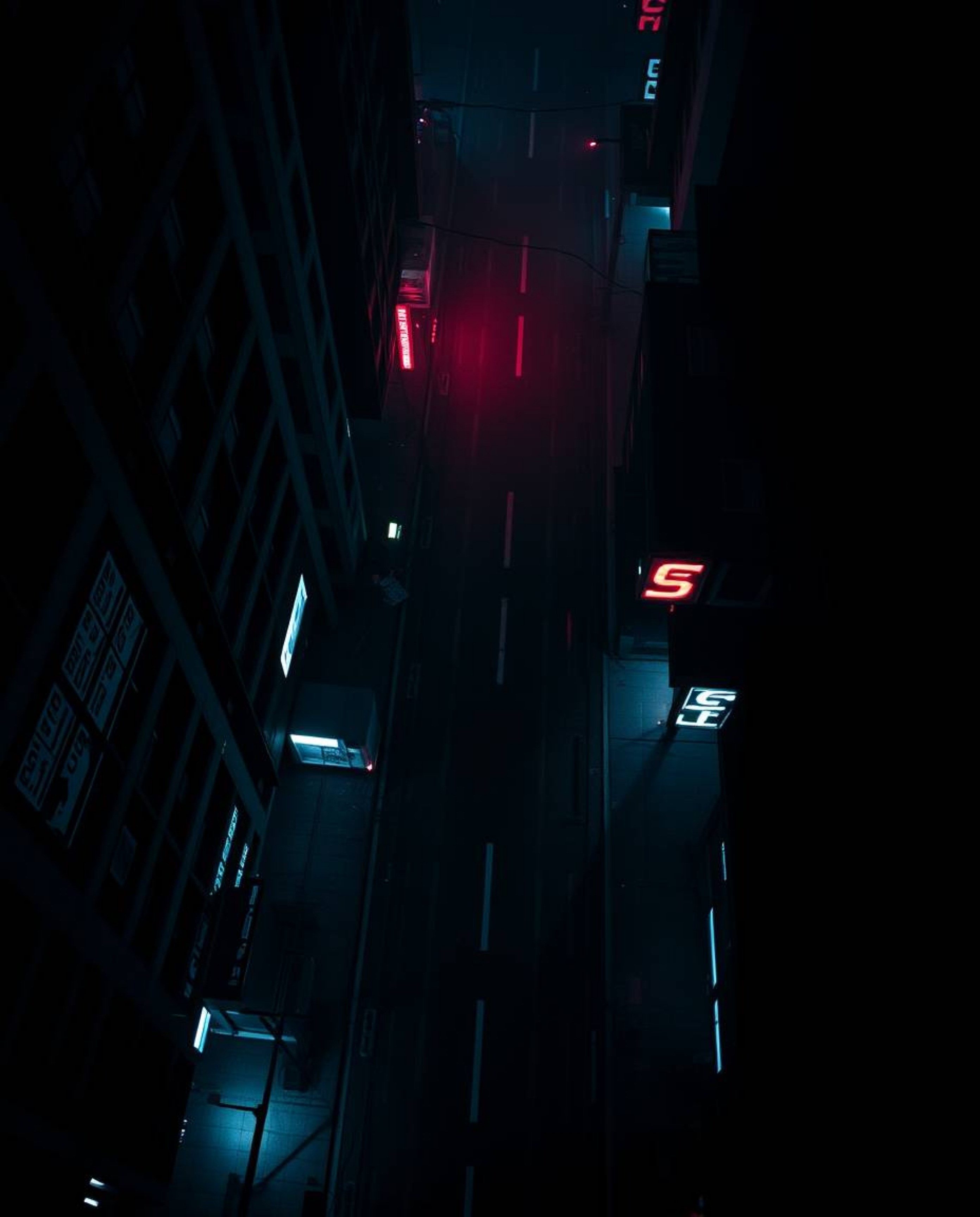 Experience a visually arresting overhead perspective of a cyberpunk street, distorted by a pixelated glitch effect. This jet-