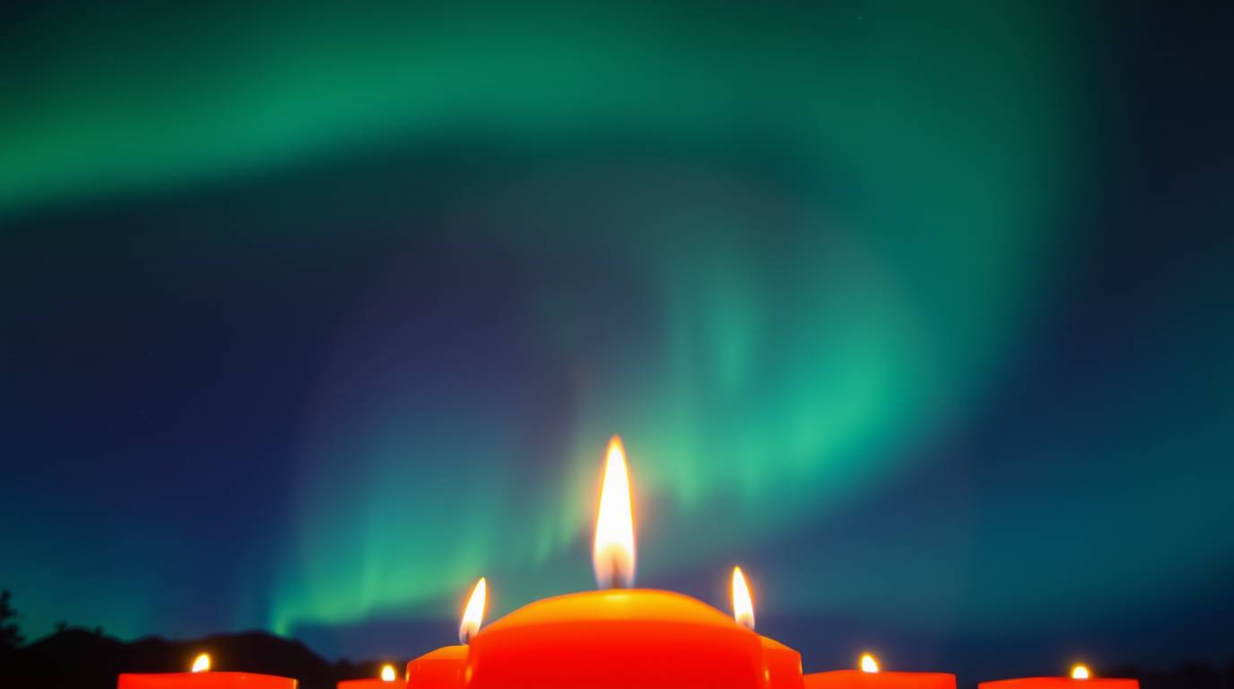 Capture the enchanting beauty of warm candlelight with flickering flames, bathed in a warm, inviting glow. This image showcas