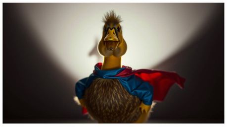 A charming and adorable duck strikes a heroic pose in a zany superhero costume, bathed in the harsh, direct light that casts 