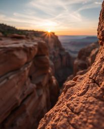 This extreme macro photograph captures the intricate beauty of sandstone cliffs in a canyon, bathed in the warm light of a su