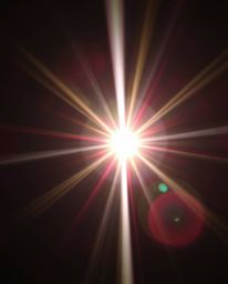 A striking image featuring a bright lens flare that creates a distinct split effect, showcasing vibrant colors and bold light