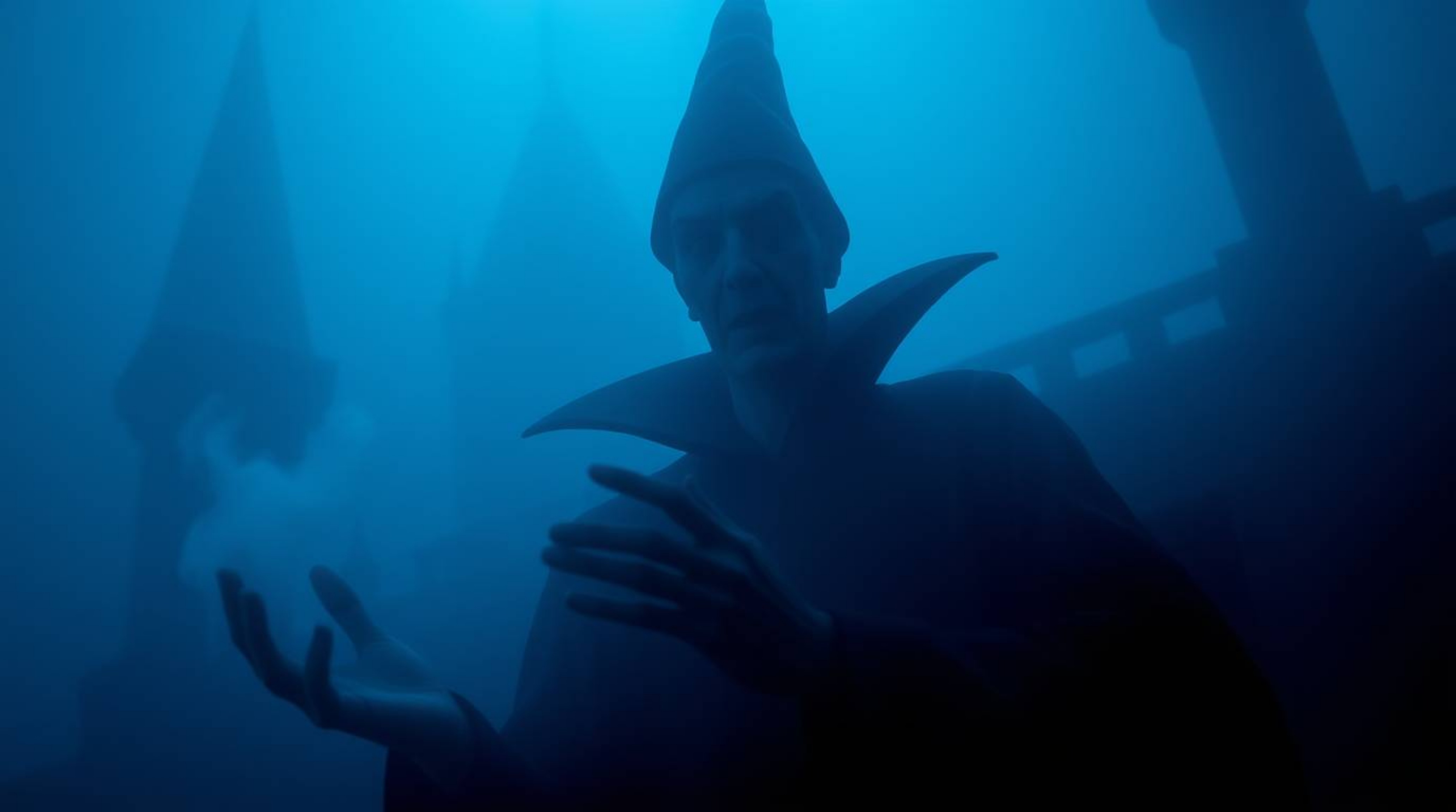 A captivating image depicting a classic Disney villain casting a spell within a mysterious, fog-shrouded castle. The thick fo