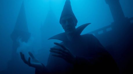 A captivating image depicting a classic Disney villain casting a spell within a mysterious, fog-shrouded castle. The thick fo