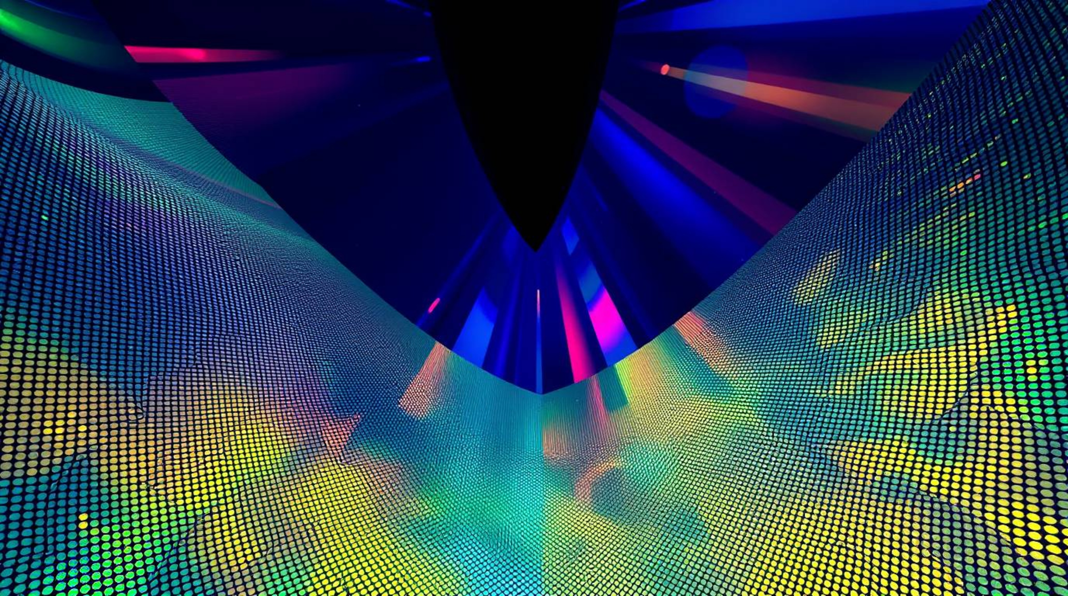 This abstract poster design utilizes a low-angle perspective, iridescent colors, and reflections to create a modern and drama