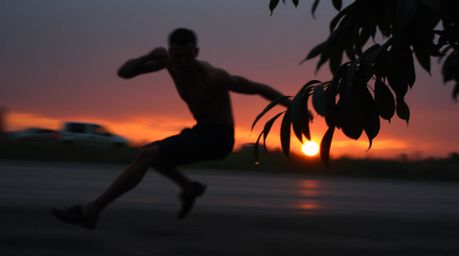 Explore stunning visuals with dynamic action poses, capturing moody styles with low contrast and strong motion blur. Witness 
