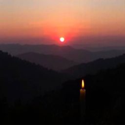 Experience the tranquility of a sunset over a quiet mountain valley.  Warm candlelight illuminates the scene, creating a smoo