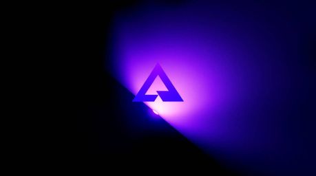 Explore logo designs featuring intense dramatic lighting and deep ultraviolet hues. These minimalist aesthetics showcase geom