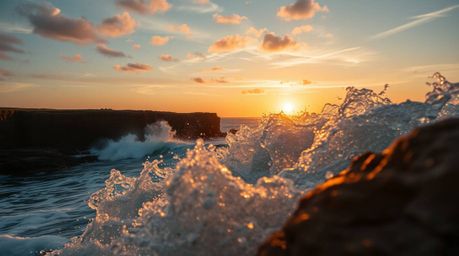 Experience the raw power and beauty of nature with this tight close-up shot featuring waves crashing against rugged cliffs be