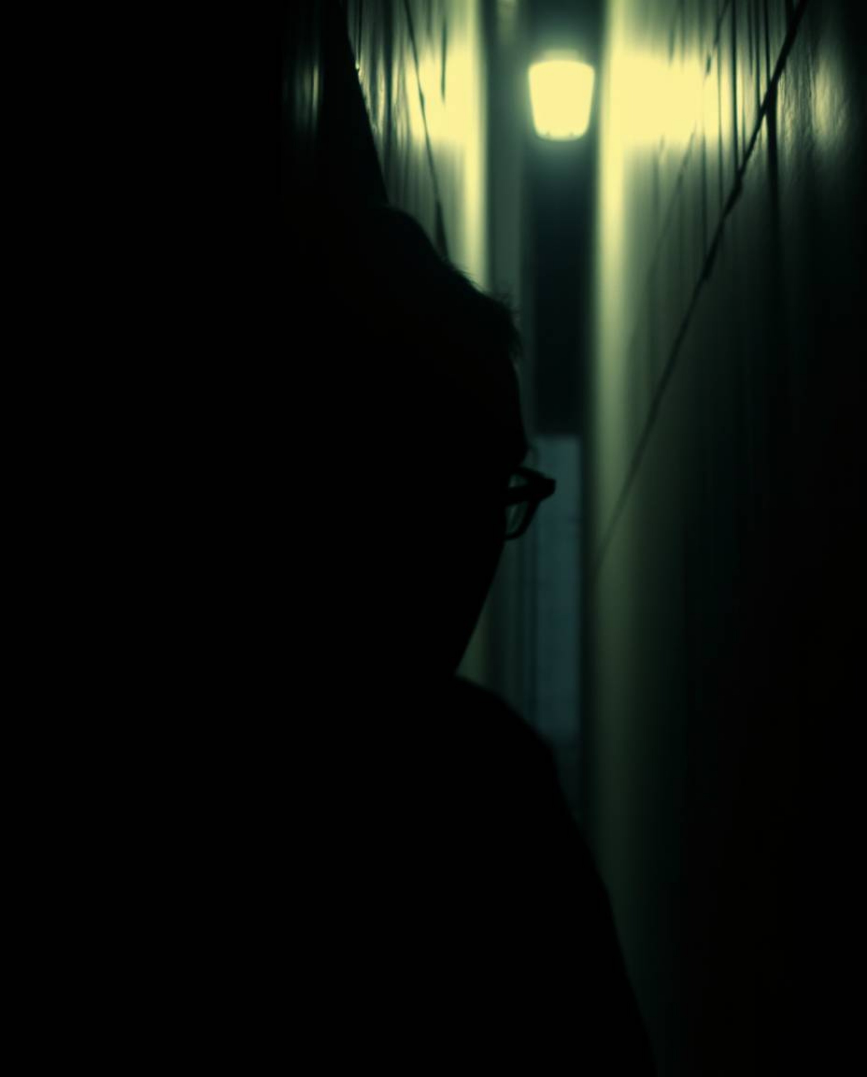 Experience a dramatic cinematic scene with eyes watching from the shadows of a night alley. This image features a film-like c
