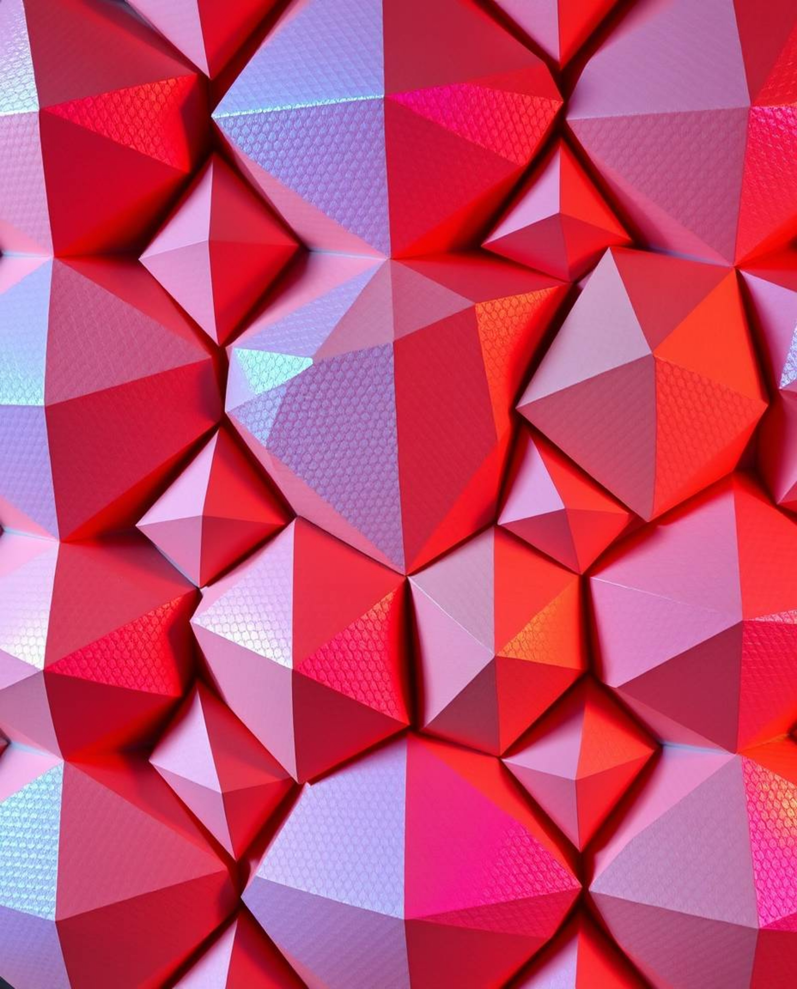 Discover a captivating sculpted papier-mâché artwork showcasing a seamless geometric pattern of hexagons and triangles in a v