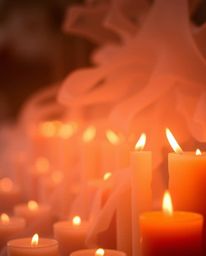 Experience a soft and mesmerizing atmosphere with warm candle lights casting flickering flames and hazy soft light, juxtapose
