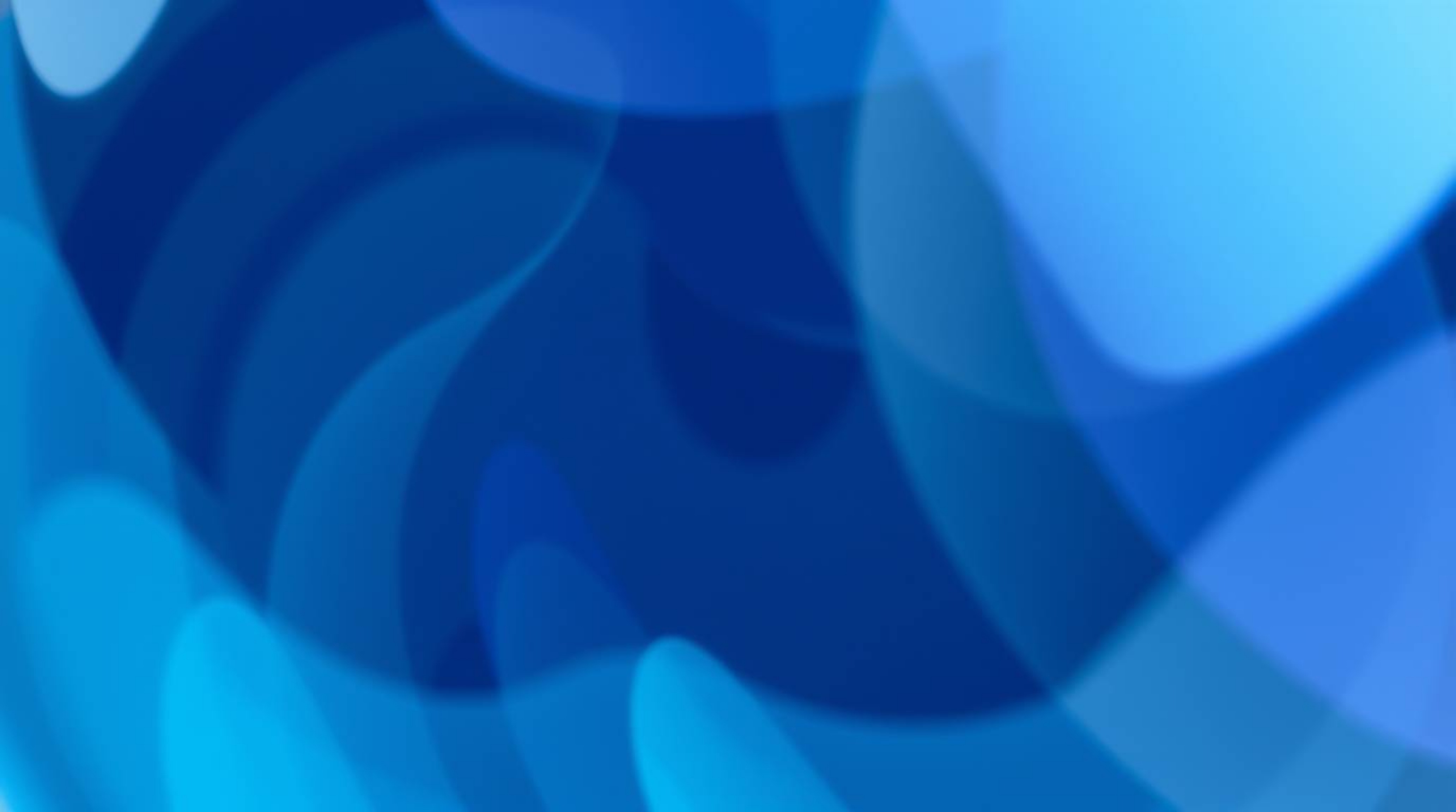 A mesmerizing close-up detail captures a glass object's reflection of smooth gradient textures in cool colors, primarily blue