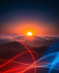 This is a creative light art piece depicting a sunset over the misty, rolling hills of Tuscany. The artwork is defined by its
