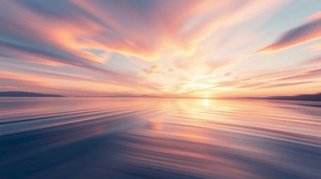 A captivating dynamic motion illustration depicts a serene lake peacefully reflecting a vibrant sunset sky.  Soft pastel colo